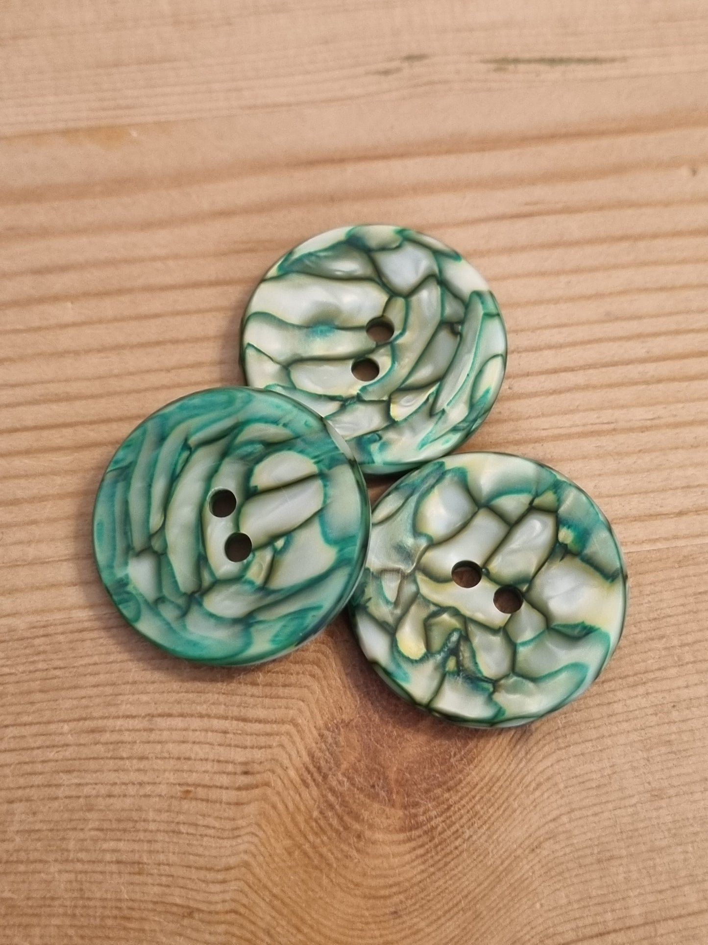 Casein buttons