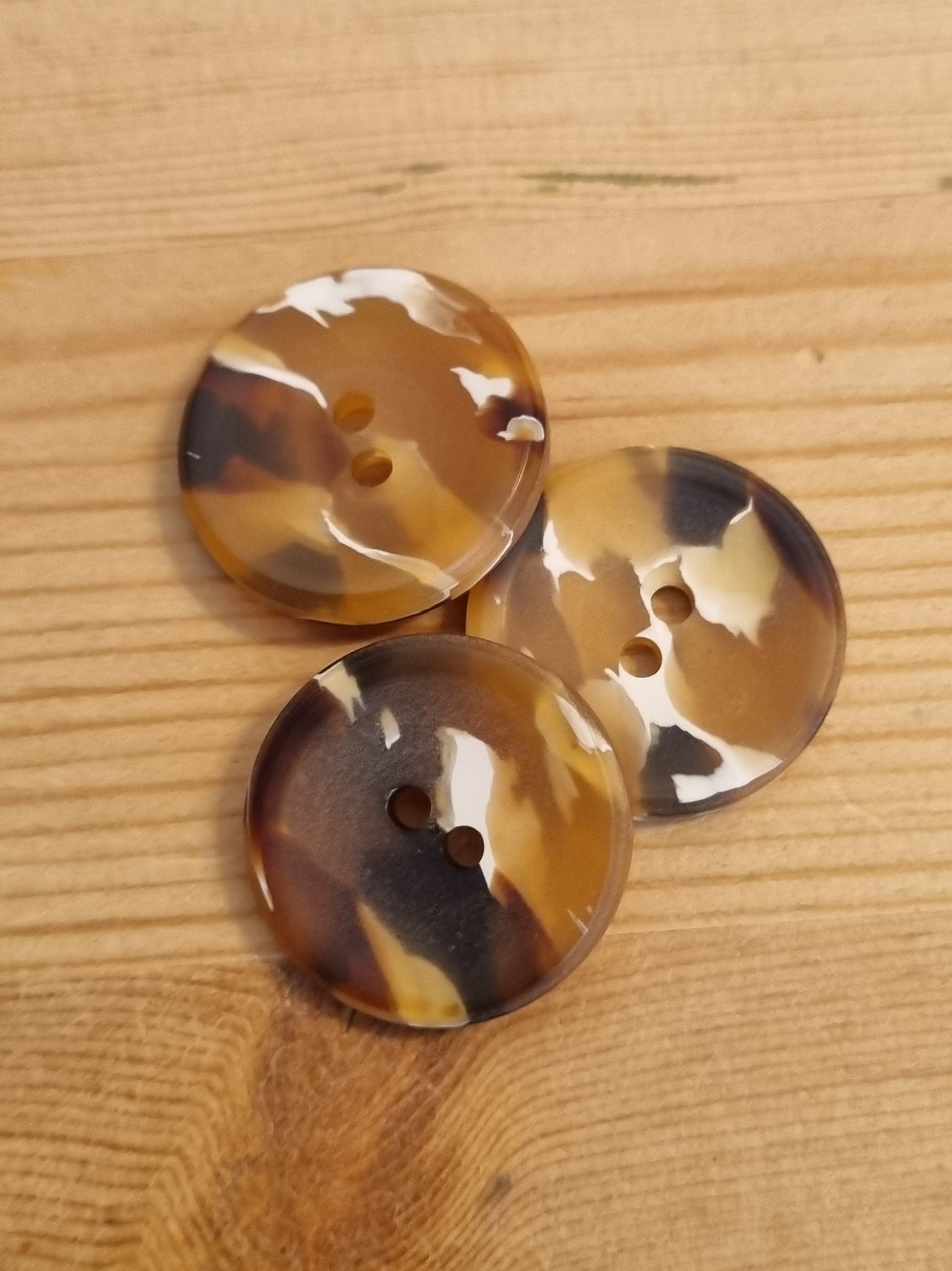 Casein buttons