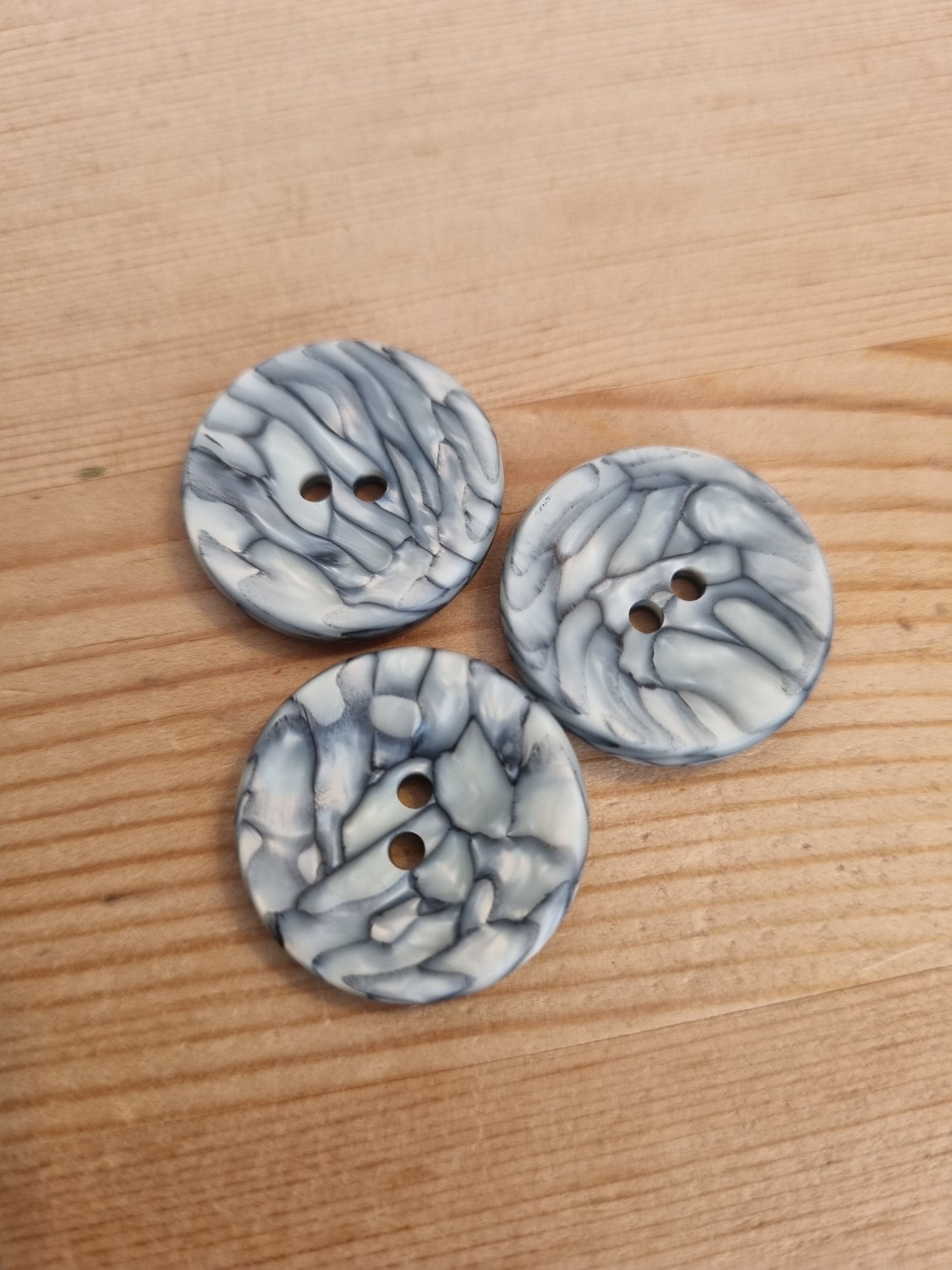 Casein buttons
