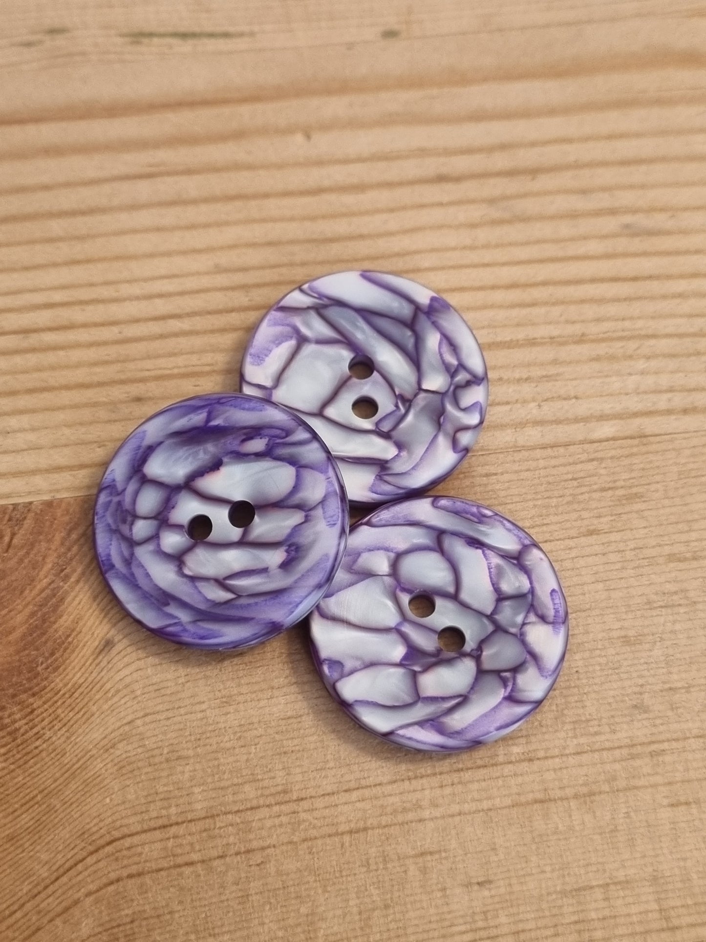 Casein buttons